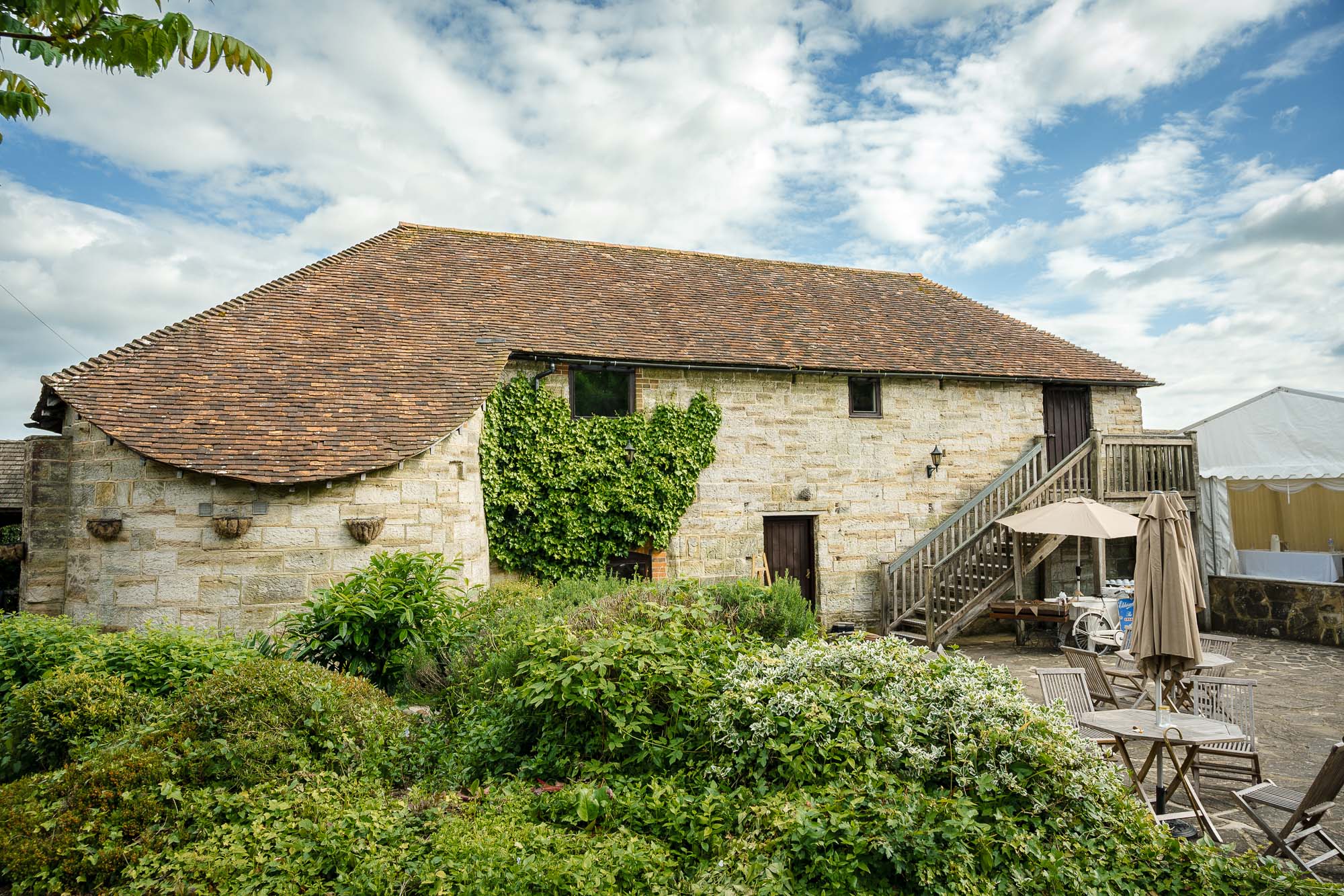 Exterior view of The Barn at Swallows Oast wedding venue, Ticehurst, East Sussex