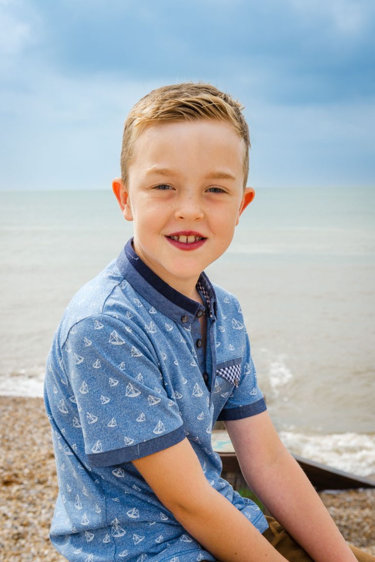 Camber Sands photo shoot, Sussex - son portrait sitting on beach