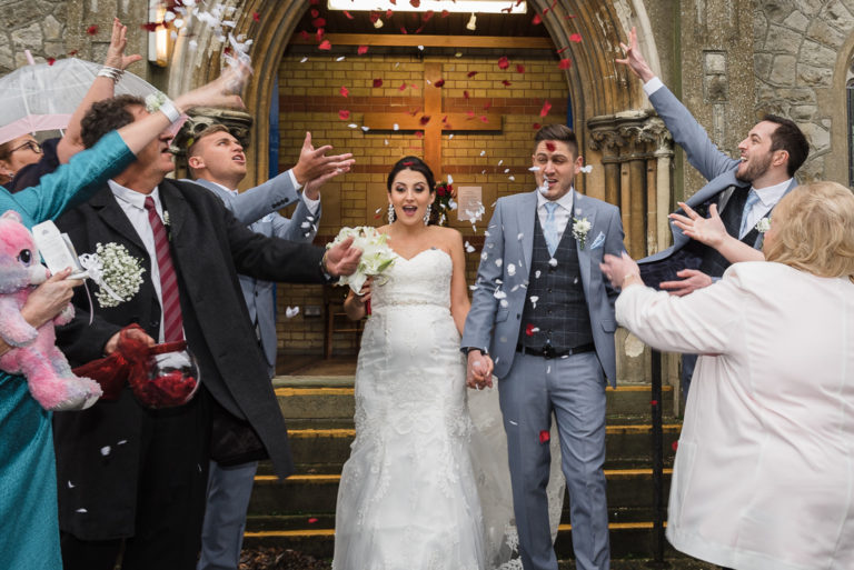 Bride and groom leaving church | Sidcup wedding of Becky and Hugo | Oakhouse Photography
