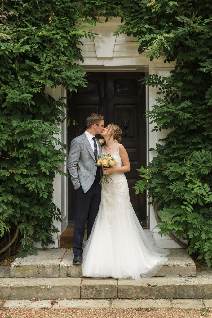 Bride and Groom posing outside Sprivers Mansion Elopement Photo Shoot | Kent Wedding Photographer | Oakhouse Photography