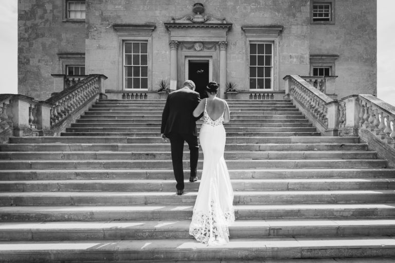 Bride and her father ascending the steps to Danson House | Oakhouse Photography