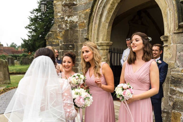 Bride and bridesmaids at Wadhurst Church, Wadhurst, East Sussex | Oakhouse Photography