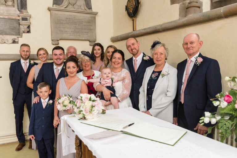 Wedding party after the signing of the register at Wadhurst Church, Wadhurst, East Sussex | Oakhouse Photography
