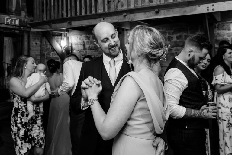 Wedding guests dancing at Swallows Oast wedding venue, Ticehurst, East Sussex | Oakhouse Photography