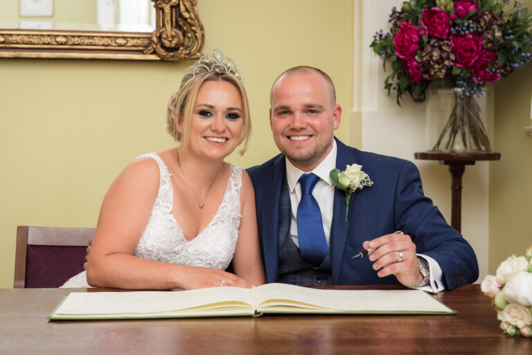 Bride and groom portrait after signing the wedding register at Chelsea Old Town Hall, King’s Road, London | Oakhouse Photography