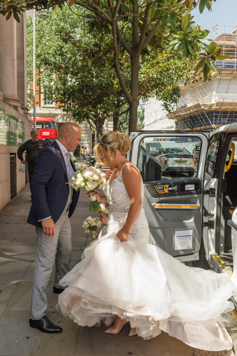 Bride arriving for her wedding at Chelsea Old Town Hall, King’s Road, London | Oakhouse Photography