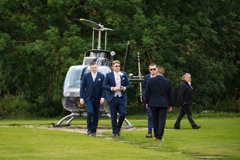 Helicopter arrival for groom and ushers arrival for Mercure Maidstone Great Danes Hotel wedding