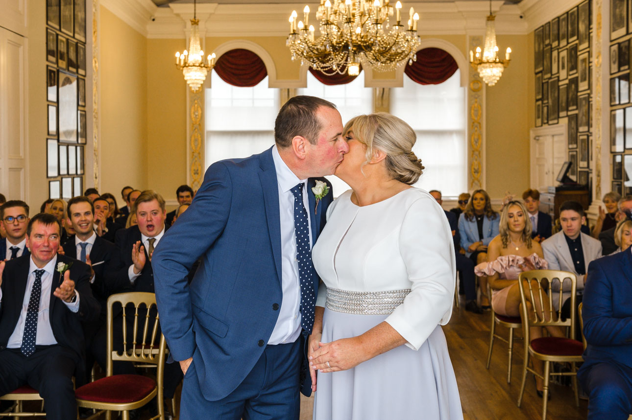 Bride and groom sharing first kiss after getting married at the Trafalgar Tavern, Greenwich | Oakhouse Photography