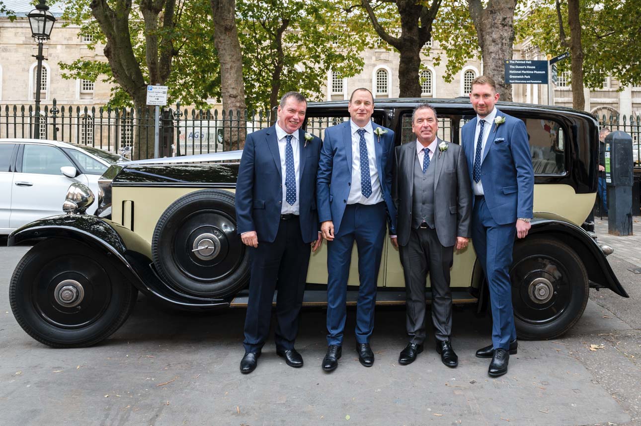 Groom, best man and ushers portrait outside the Trafalgar Tavern | Oakhouse Photography