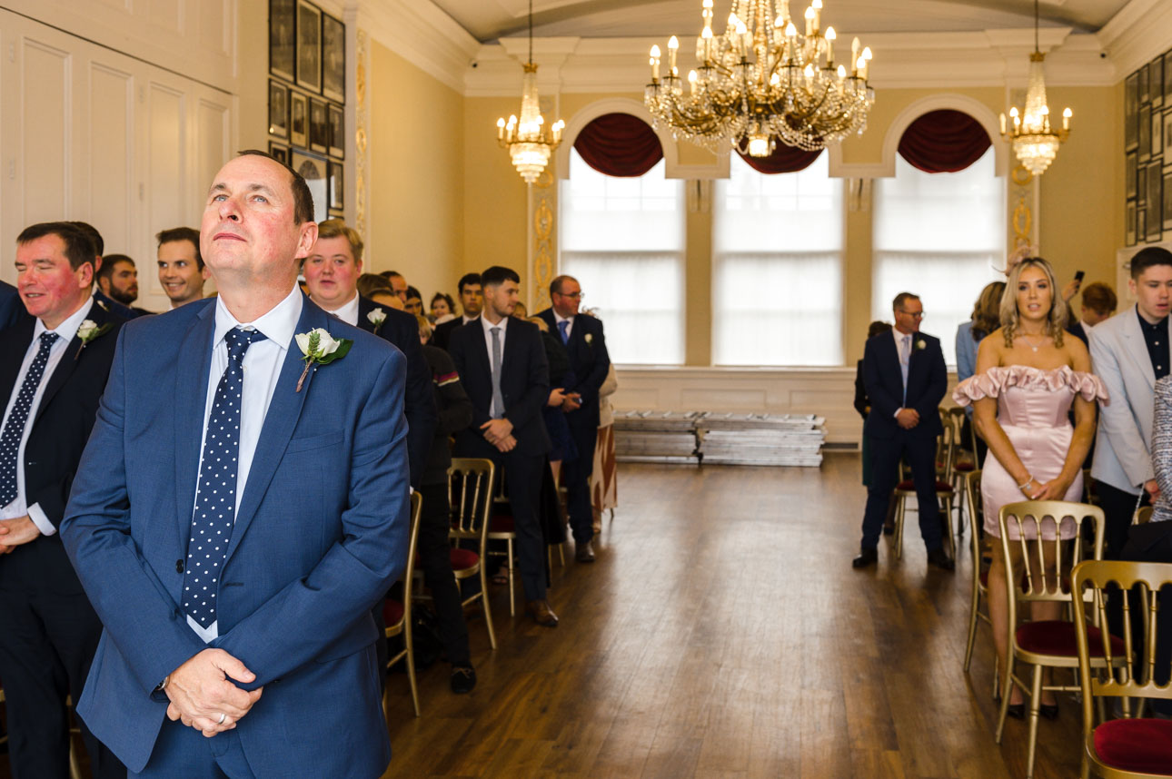 Groom awaiting bride's arrival into ceremony room at the Trafalgar Tavern, Greenwich | Oakhouse Photography