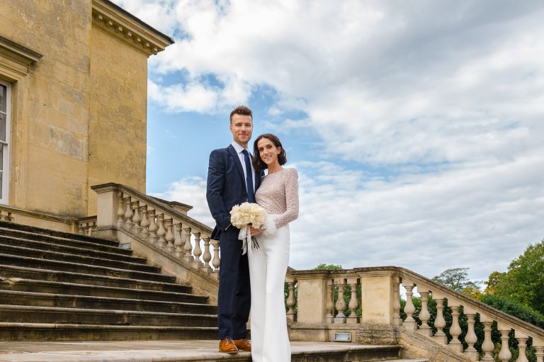 Portrait of bride and groom on the steps of Danson House, Danson Park, Bexleyheath, Kent