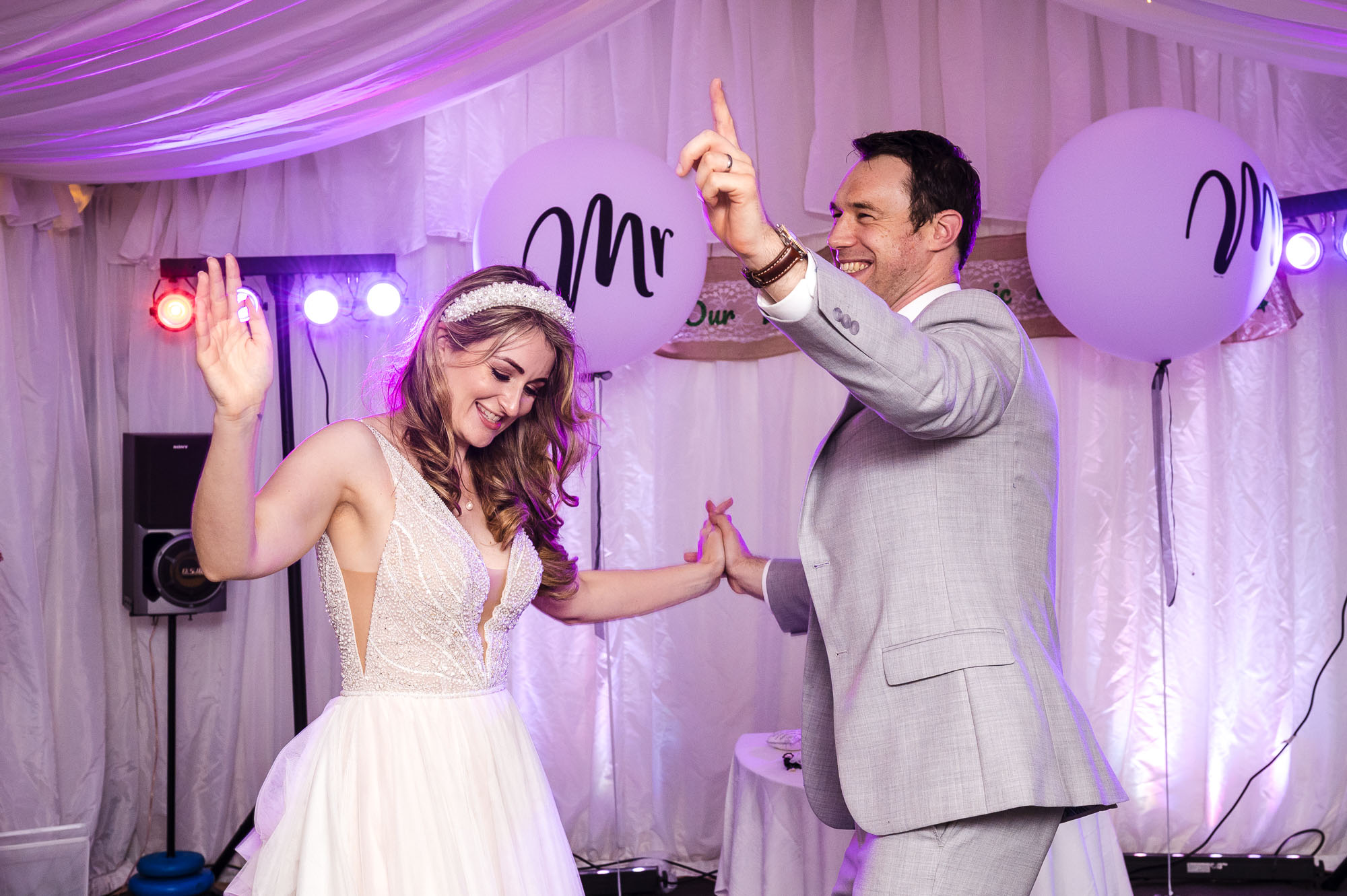 Bride and groom's first dance in a marquee wedding reception in Eltham, London
