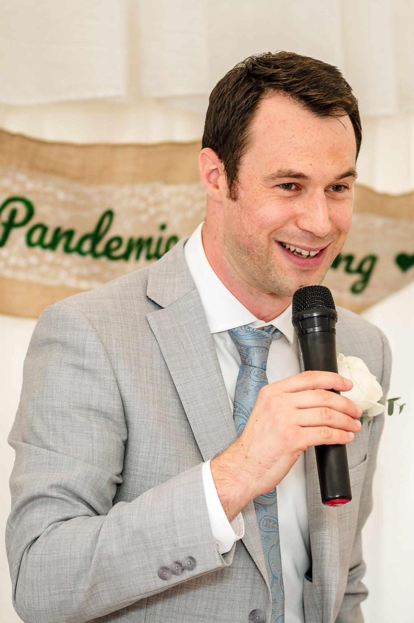 Documentary photograph of the groom reading his wedding speech at a Eltham, London wedding