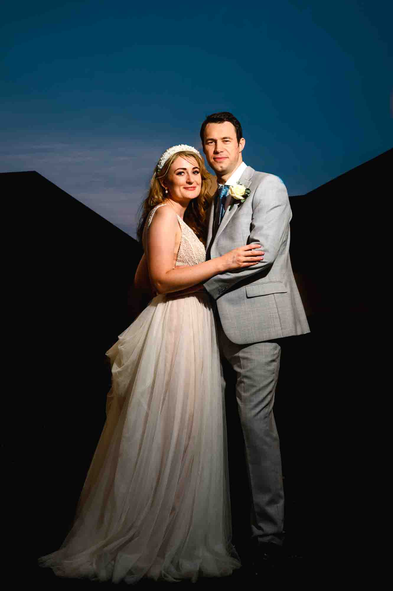 Bride and groom sunset portrait using creative off-camera flash in Eltham, London