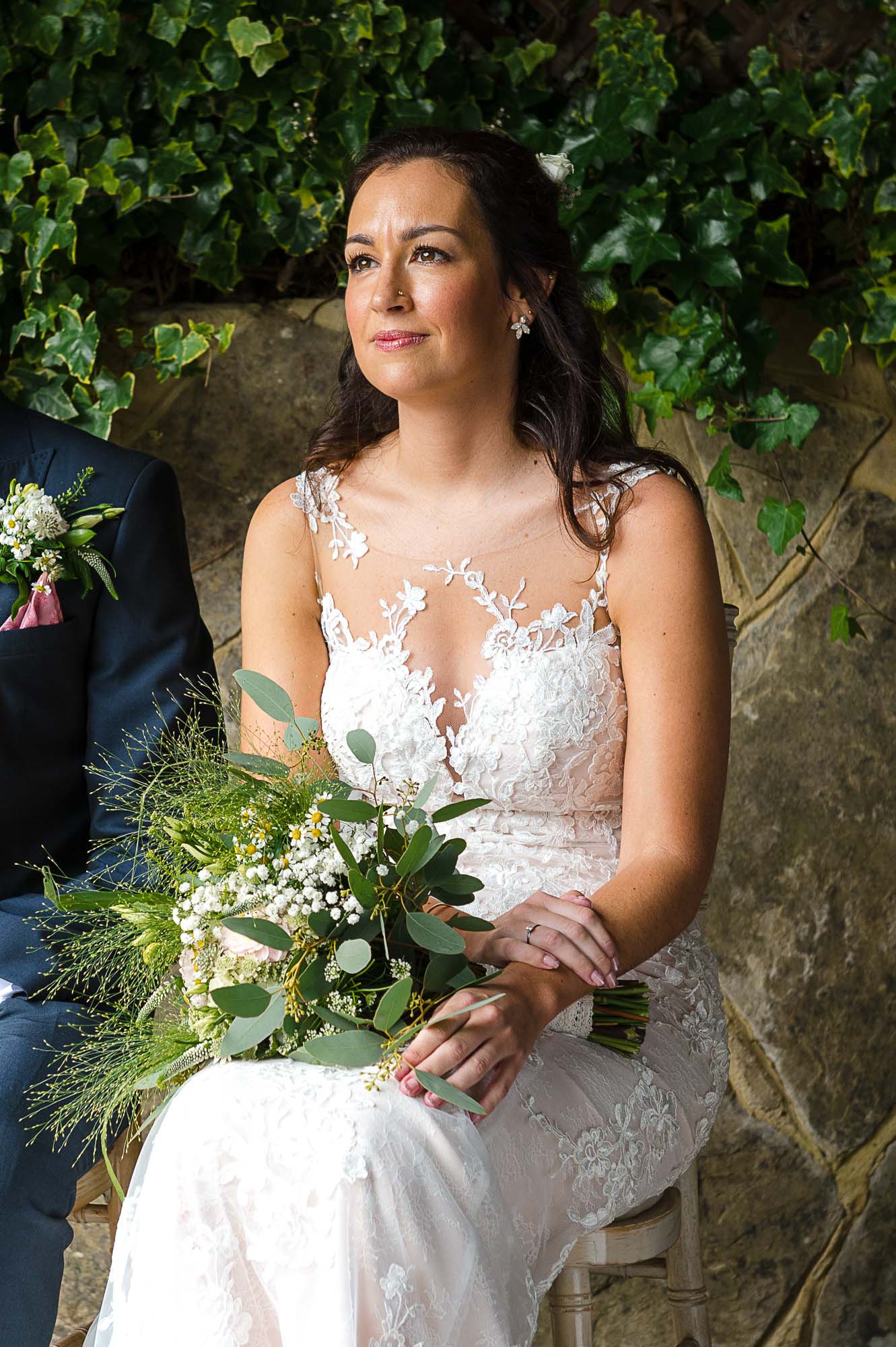Candid documentary photograph of bride under The Pavilion at their Swallows Oast wedding venue in Ticehurst, East Sussex