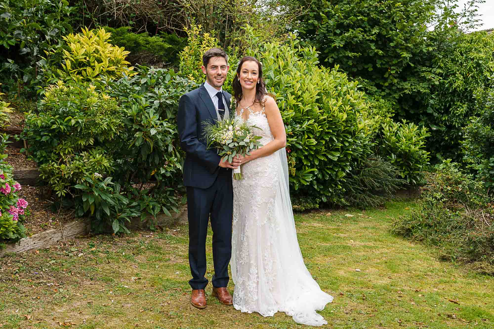 Bride and groom portrait at Swallows Oast wedding venue in Ticehurst, East Sussex