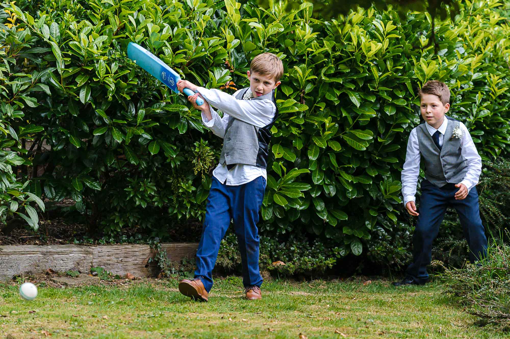 Children playing lawn games at Swallows Oast wedding in Ticehurst, East Sussex