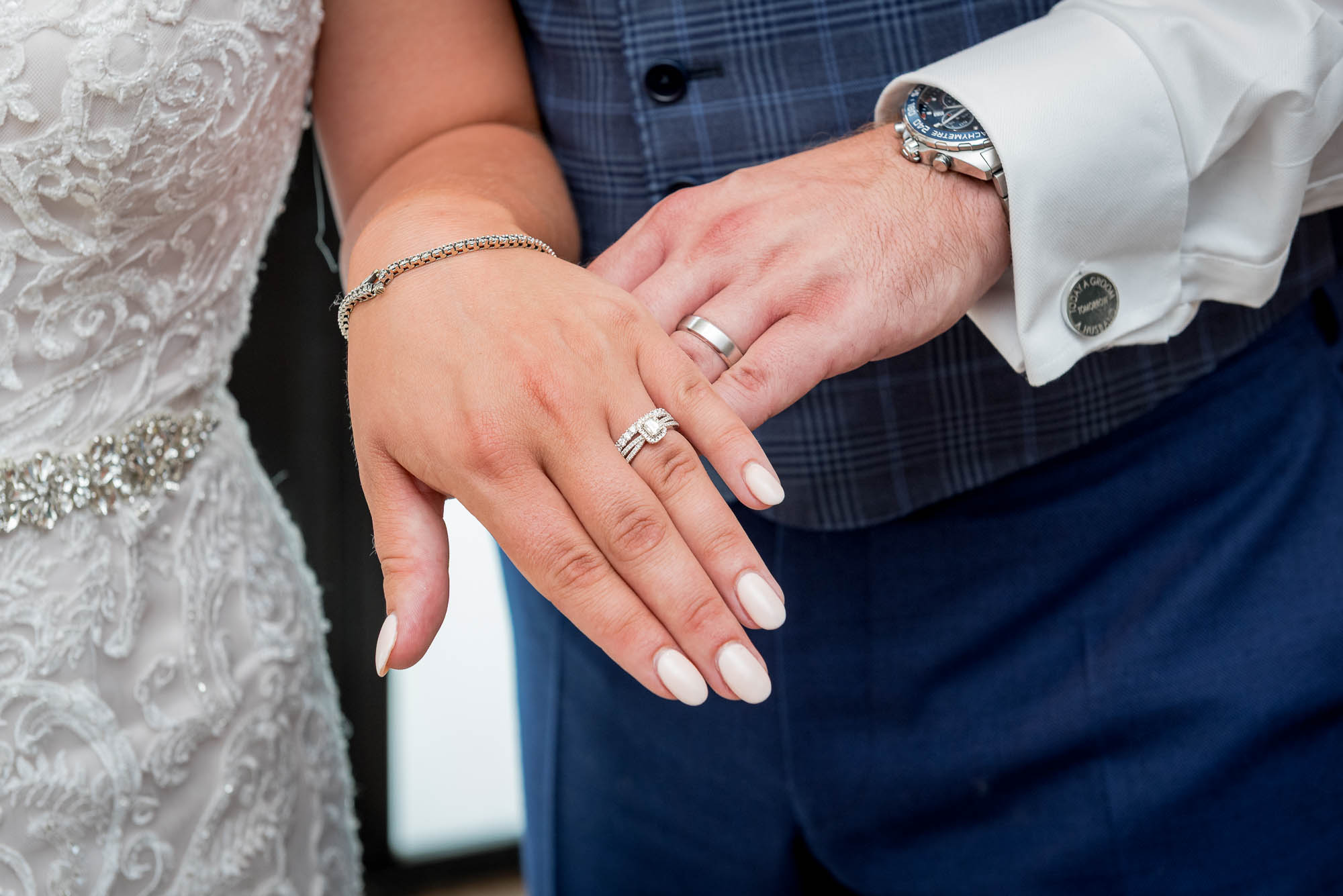 Bride and groom's wedding rings at Bluebird Chelsea