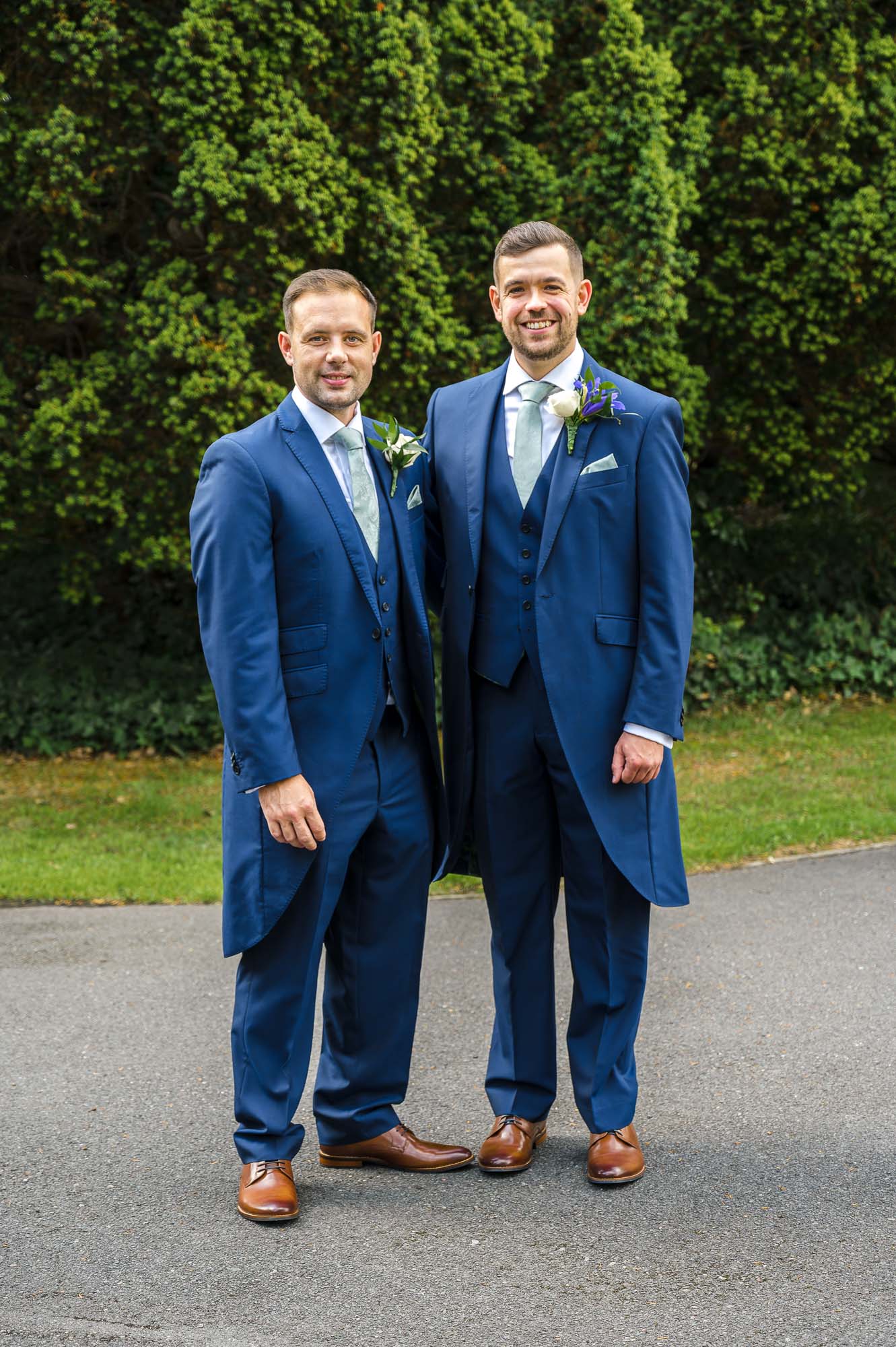 Groom and best man portrait outside of St John the Evangelist Church, Bexley, Kent.