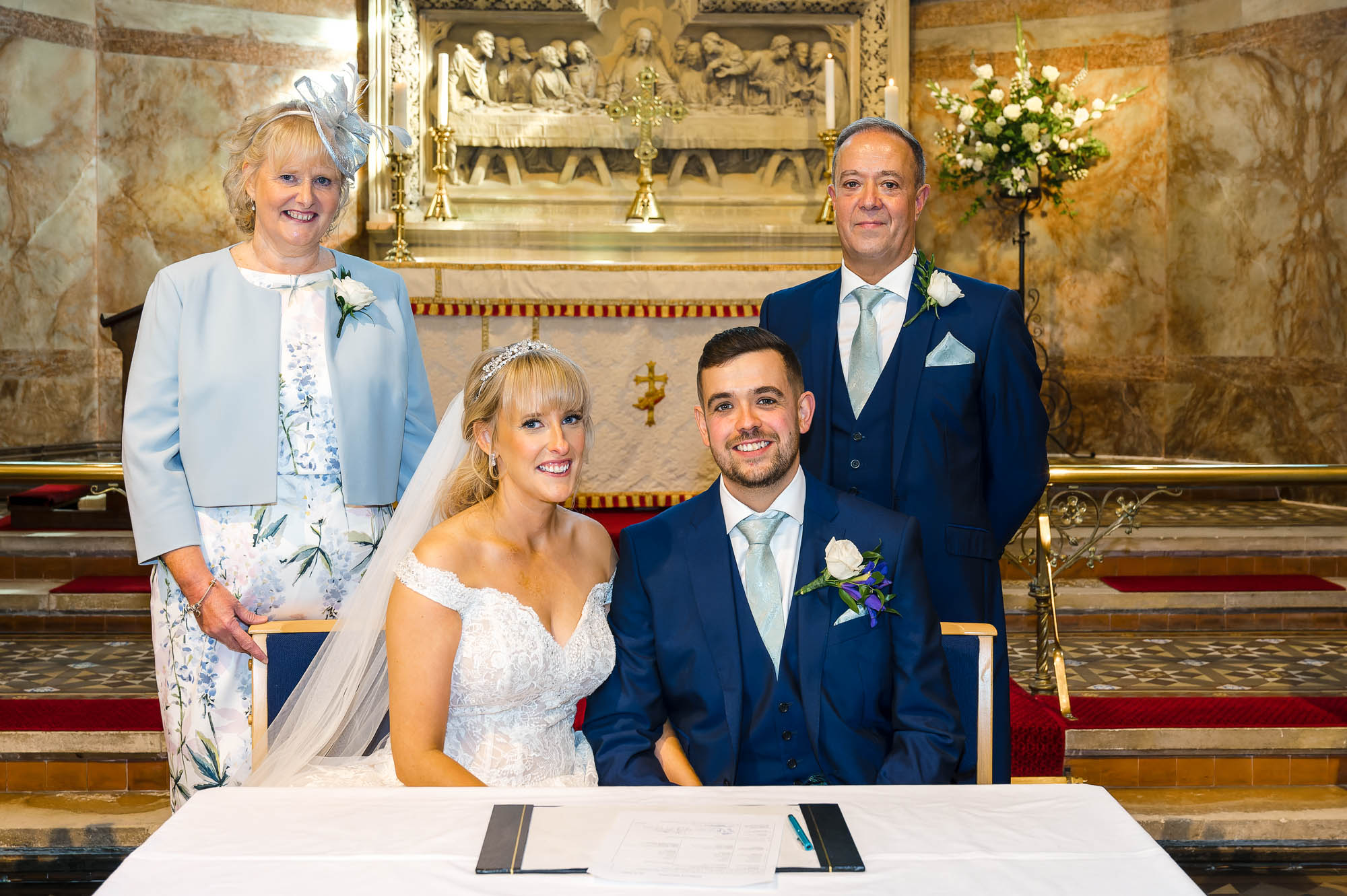 Bride, groom and witnesses after signing the register at St John the Evangelist Church, Bexley, Kent