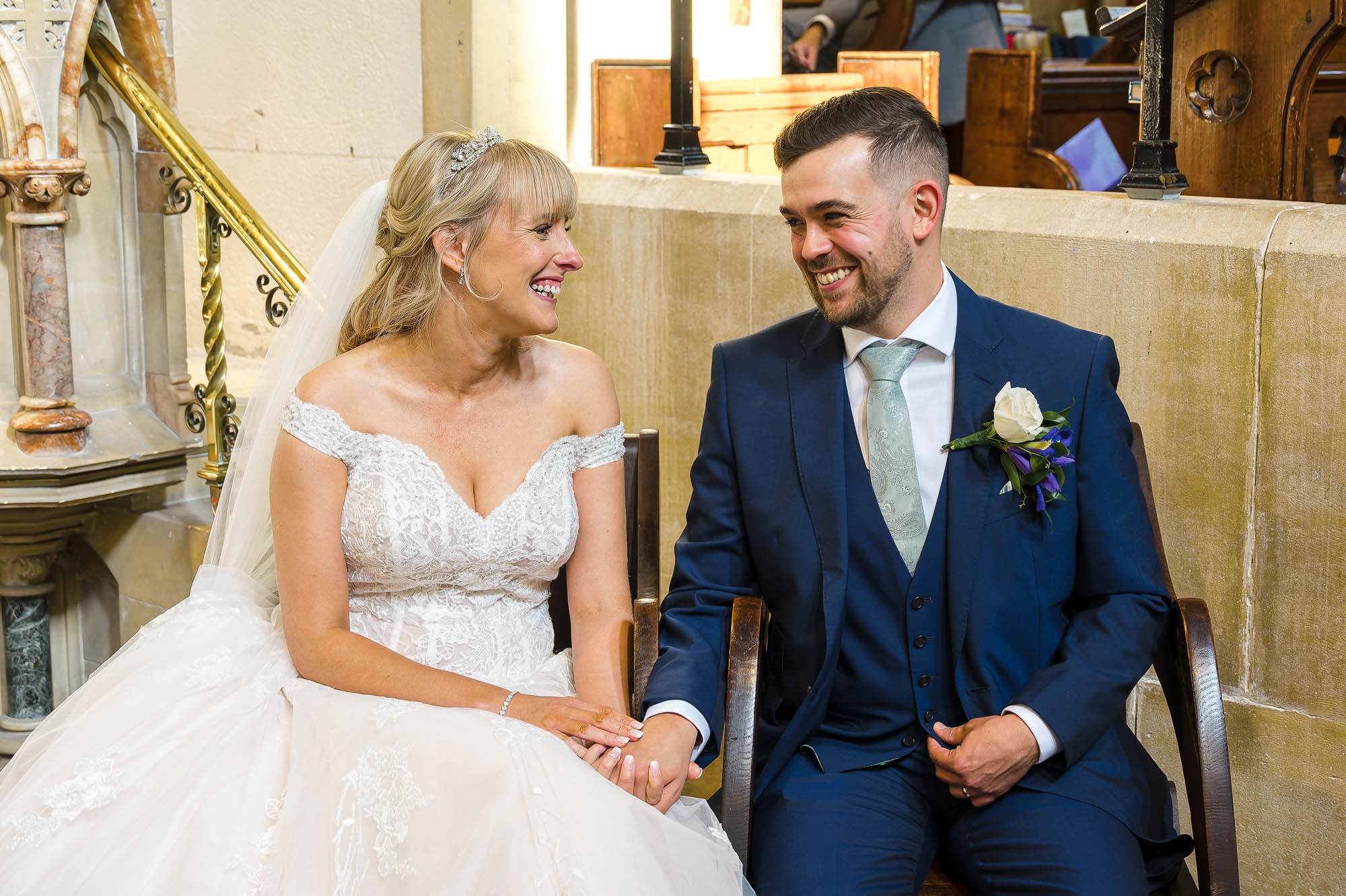 Bride and groom looking at each other after their wedding ceremony at St John the Evangelist Church, Bexley