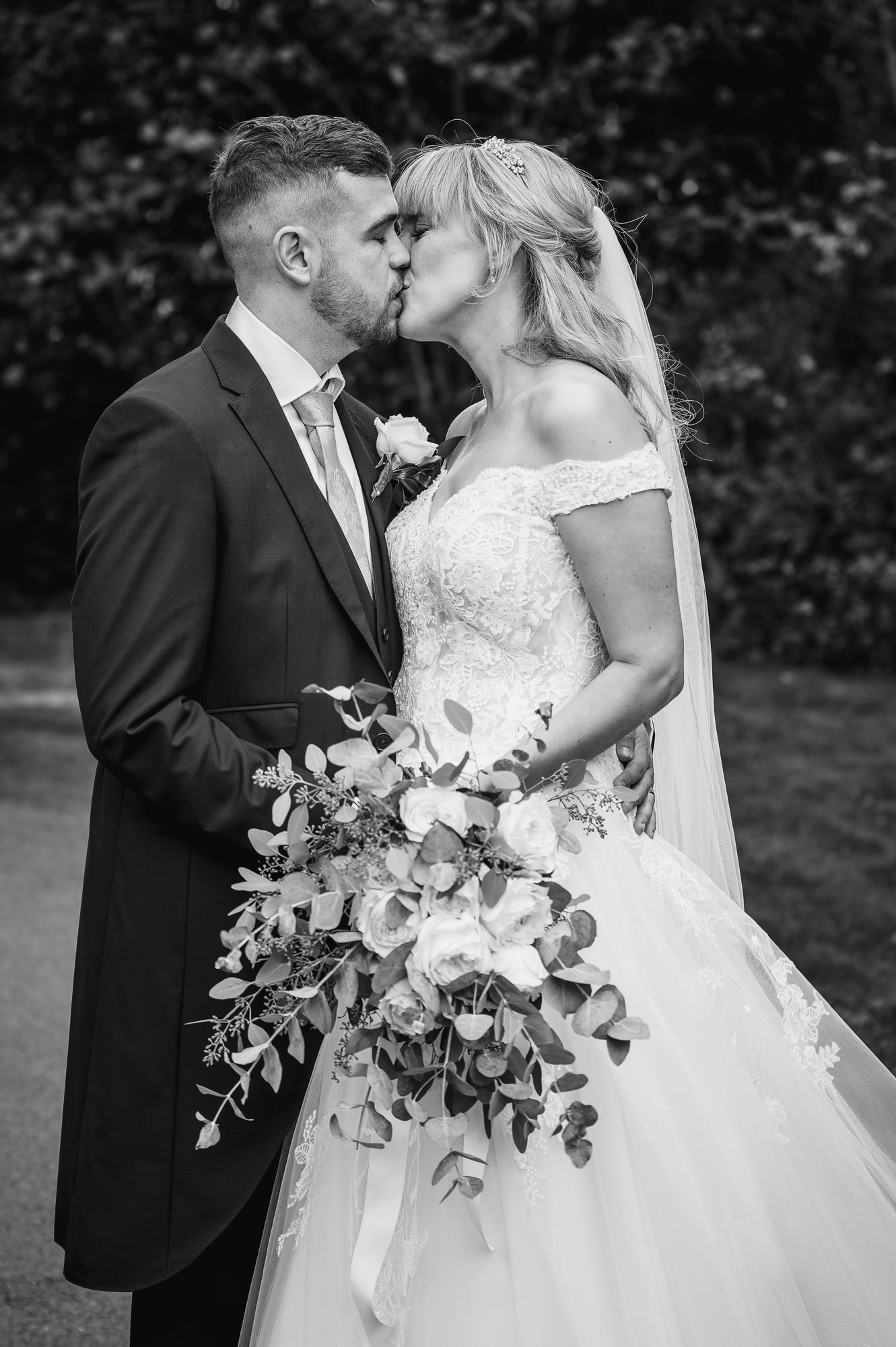 Bride and groom portrait in the grounds of St John the Evangelist Church, Bexley, Kent