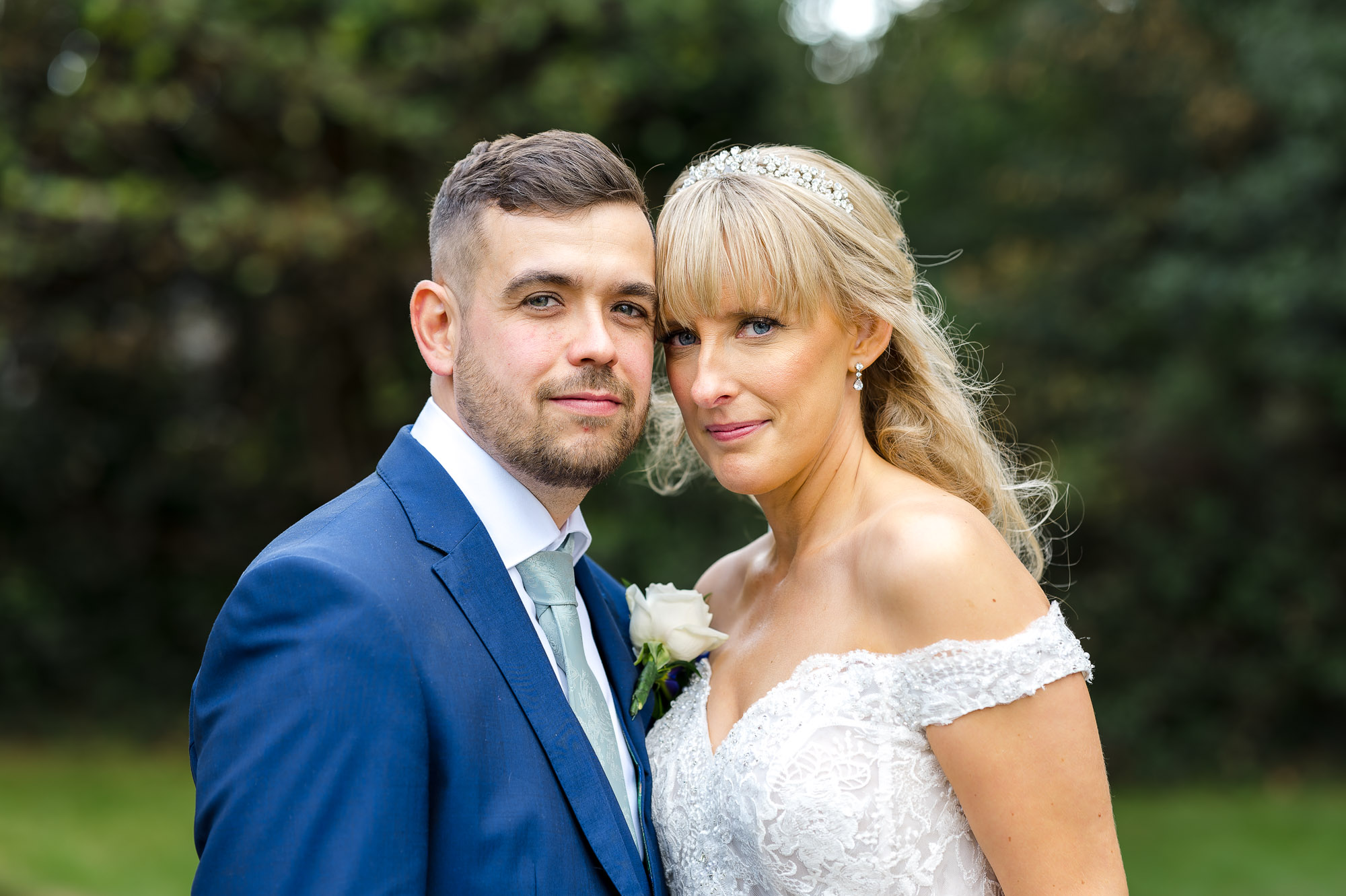 Bride and groom portrait in the grounds of St John the Evangelist Church, Bexley, Kent